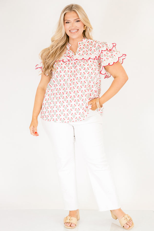 Chic Soul plus size clothing, white short flutter sleeve top with pink and green small floral pattern and pink scallop trimming along the sleeves through the top