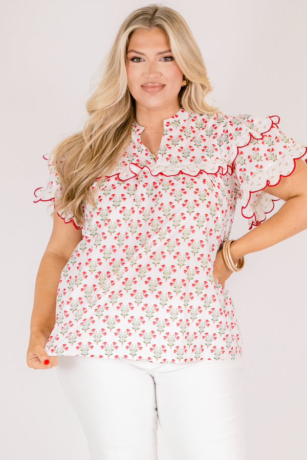 Chic Soul plus size clothing, white short flutter sleeve top with pink and green small floral pattern and pink scallop trimming along the sleeves through the top