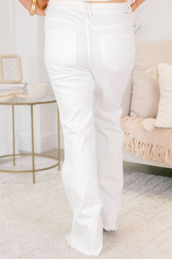 Chic Soul plus size clothing, white flared jeans with front pockets and fringe details at the bottom of each pant leg 