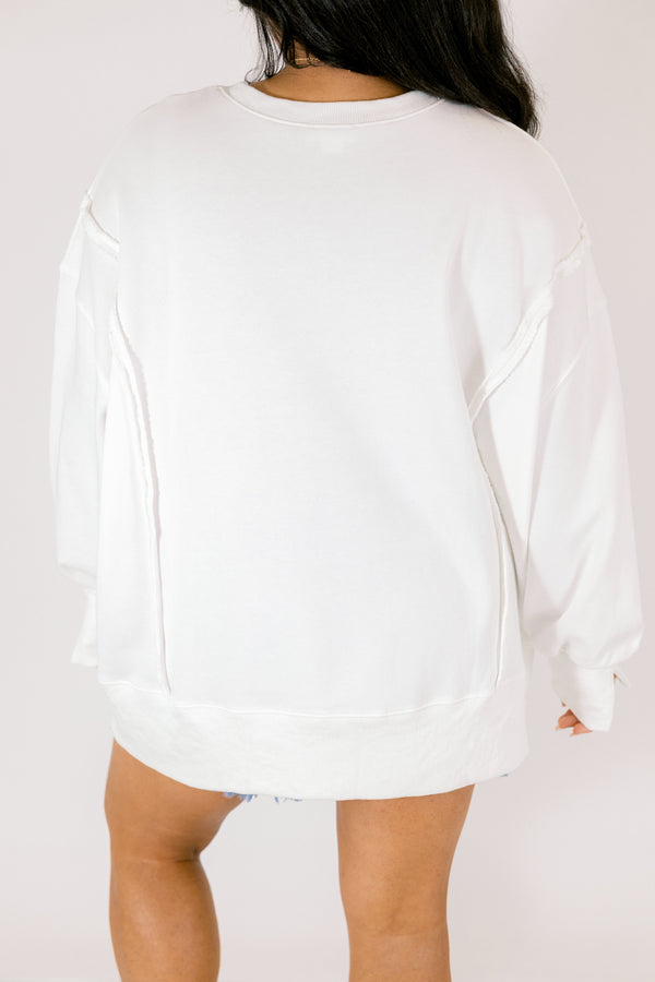 Chic Soul plus size clothing, off white long sleeve crew neck with checkerboard and flower graphic