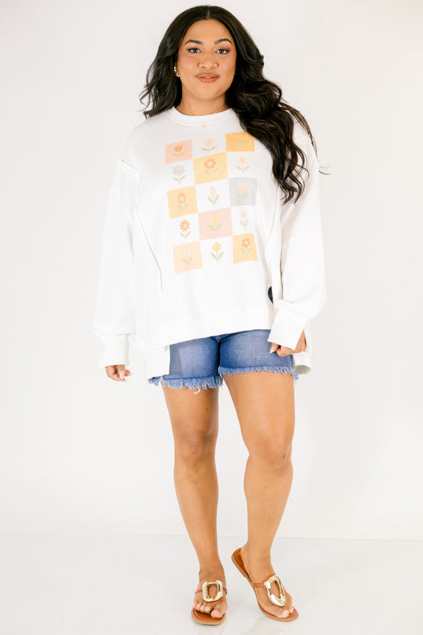 Chic Soul plus size clothing, off white long sleeve crew neck with checkerboard and flower graphic