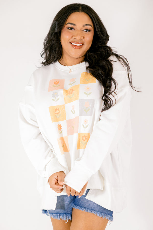 Chic Soul plus size clothing, off white long sleeve crew neck with checkerboard and flower graphic