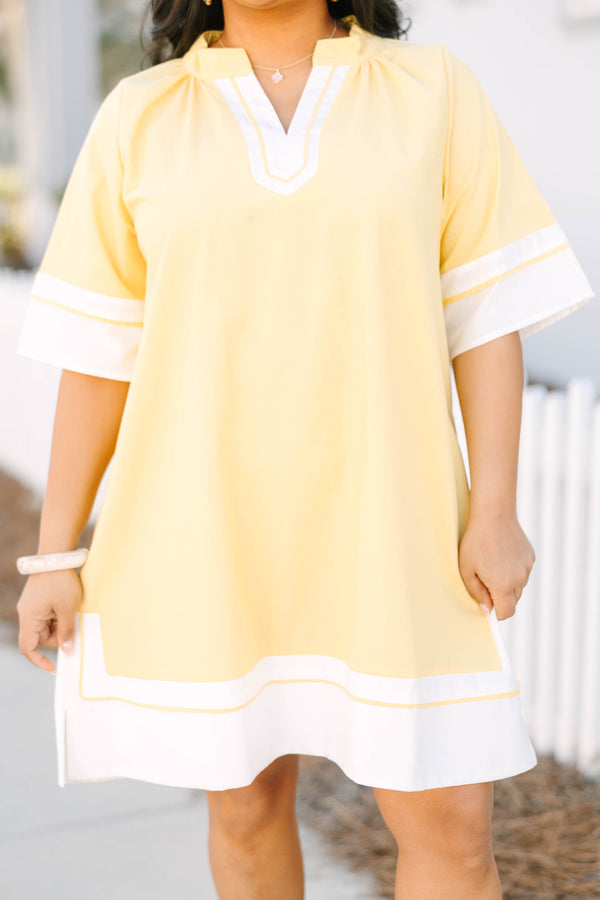 Chic Soul plus size clothing, yellow short sleeve straight cut dress with white trim along the hem, neckline, and sleeves