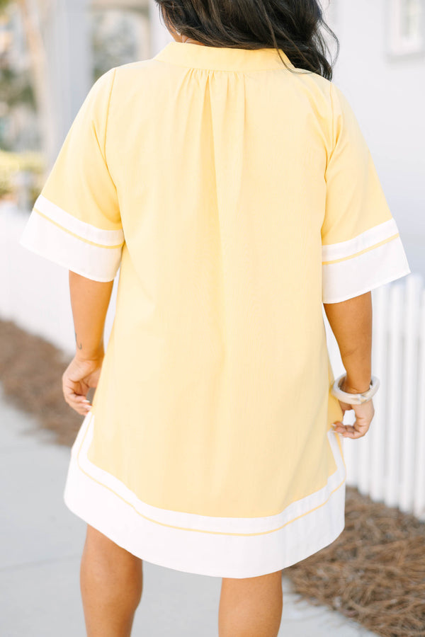 Chic Soul plus size clothing, yellow short sleeve straight cut dress with white trim along the hem, neckline, and sleeves