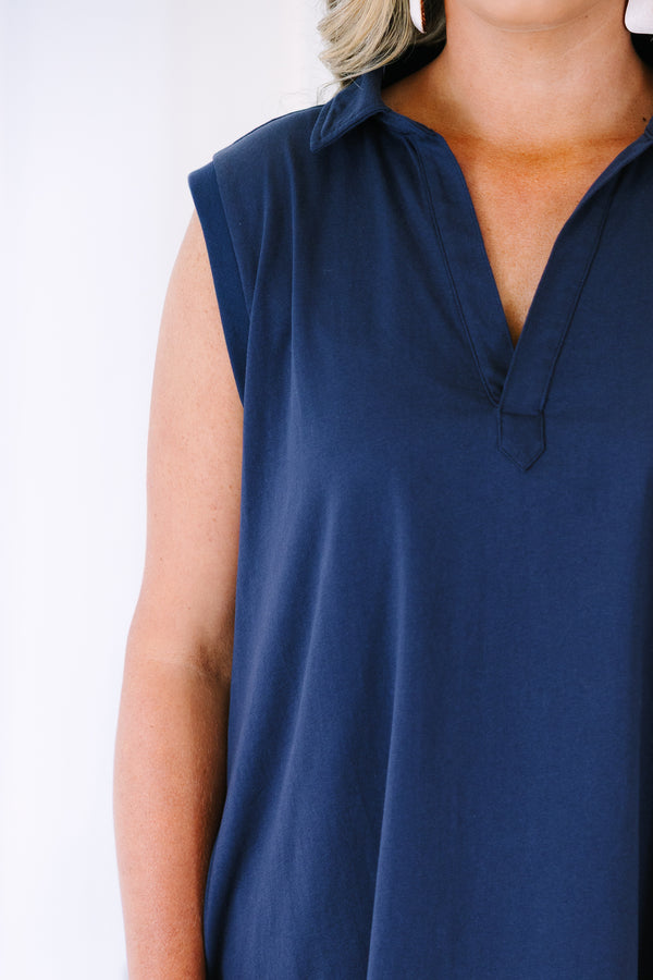 Plus Size navy blue sleeveless shift dress with a collared V-neckline.