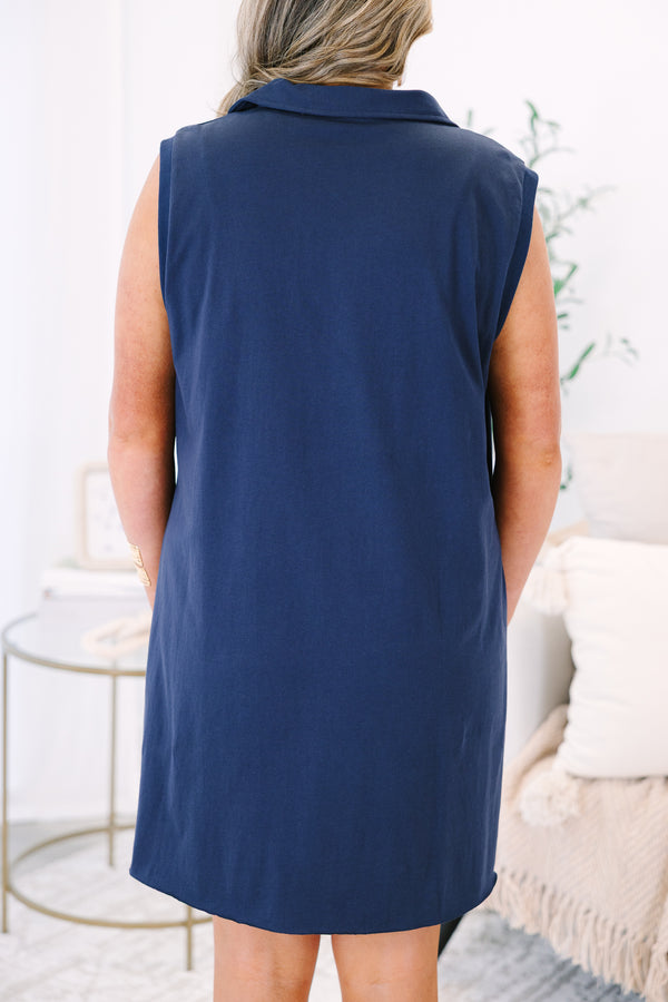 Plus Size navy blue sleeveless shift dress with a collared V-neckline.