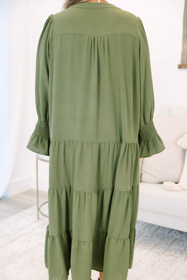 Plus size forest green tiered midi dress with a flowy fit, V-neckline, and ruffled sleeves.