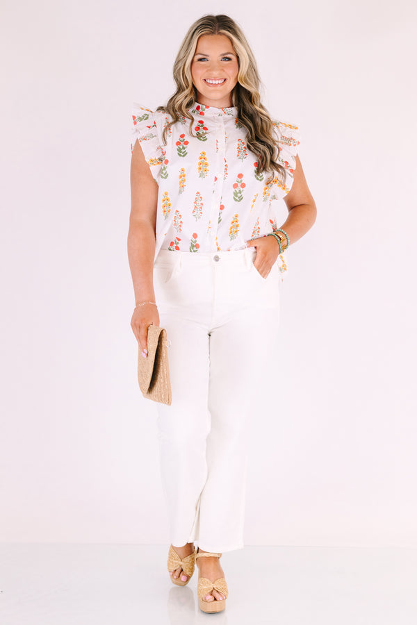 Chic Soul plus size clothing, white button-up top with flutter sleeves and a red and yellow floral pattern throughout 