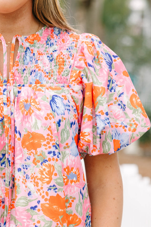 Chic Soul plus size clothing, pink and orange floral short puff sleeve short dress with tiered skirt and tassel ties at the top of the v-neckline