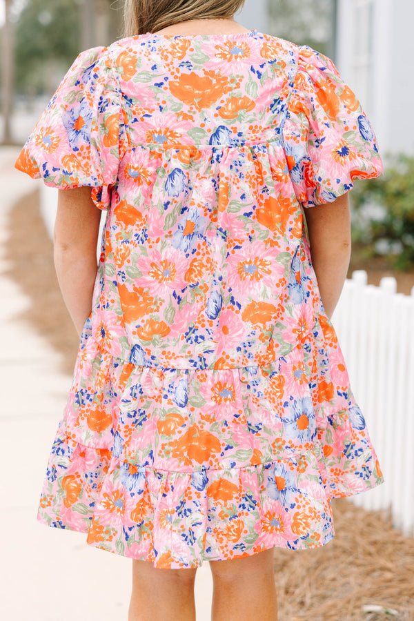 Chic Soul plus size clothing, pink and orange floral short puff sleeve short dress with tiered skirt and tassel ties at the top of the v-neckline