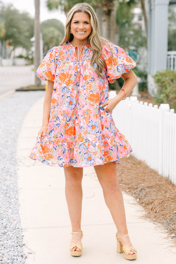 Chic Soul plus size clothing, pink and orange floral short puff sleeve short dress with tiered skirt and tassel ties at the top of the v-neckline