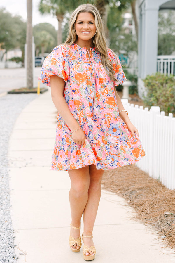 Chic Soul plus size clothing, pink and orange floral short puff sleeve short dress with tiered skirt and tassel ties at the top of the v-neckline