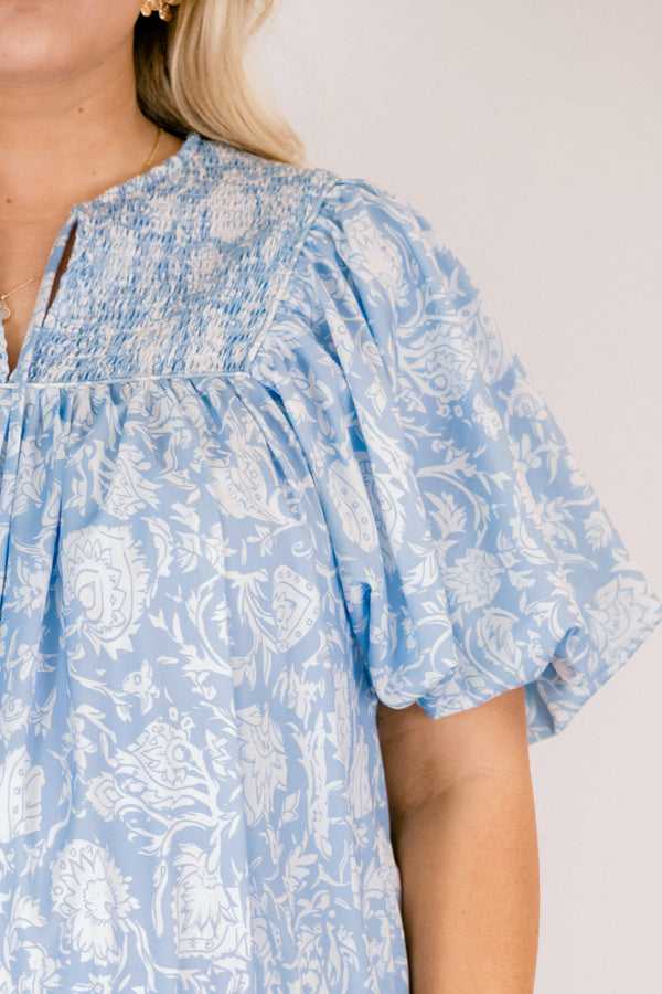 Chic Soul plus size clothing, light blue floral print short puff sleeve tiered baby doll dress with v neck cutout and tassels hanging from the neckline