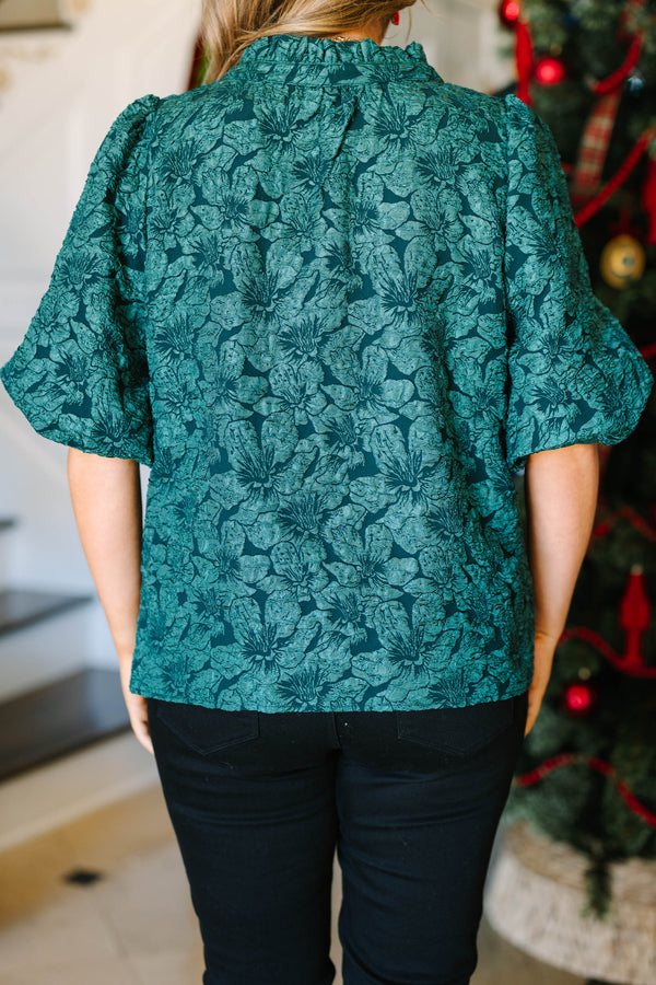 Plus Size green floral jacquard top with a split neckline and short puff sleeves.
