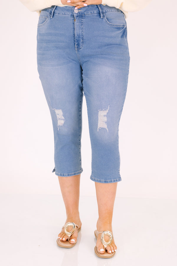 Chic Soul plus size clothing, medium wash blue jean capris with distressing on each knee 