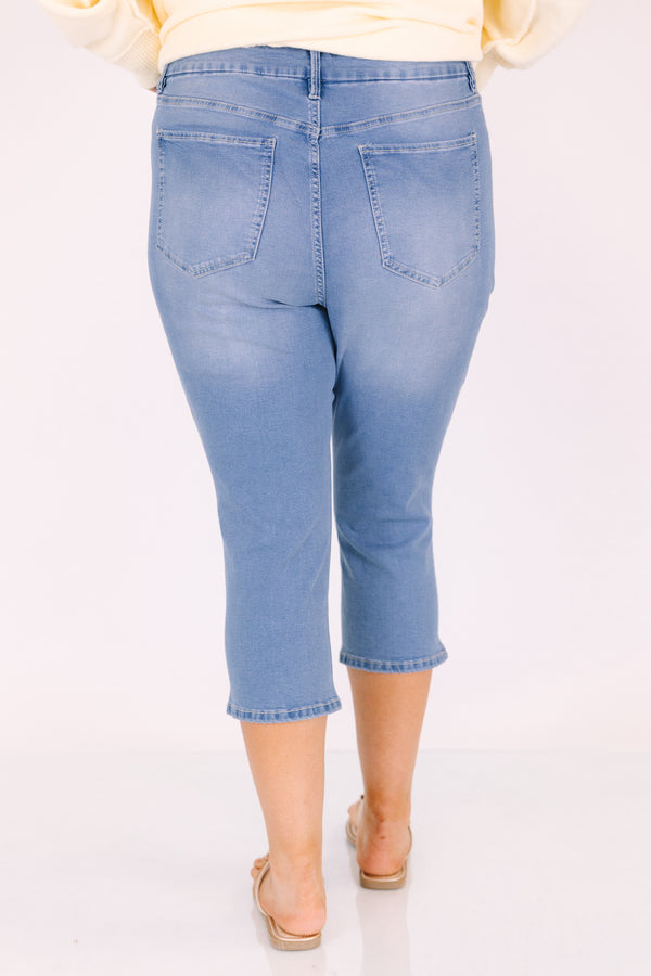 Chic Soul plus size clothing, medium wash blue jean capris with distressing on each knee 