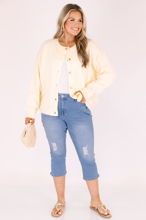 Chic Soul plus size clothing, medium wash blue jean capris with distressing on each knee 