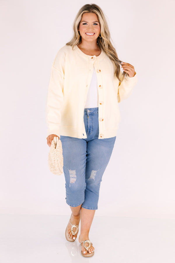 Chic Soul plus size clothing, medium wash blue jean capris with distressing on each knee 