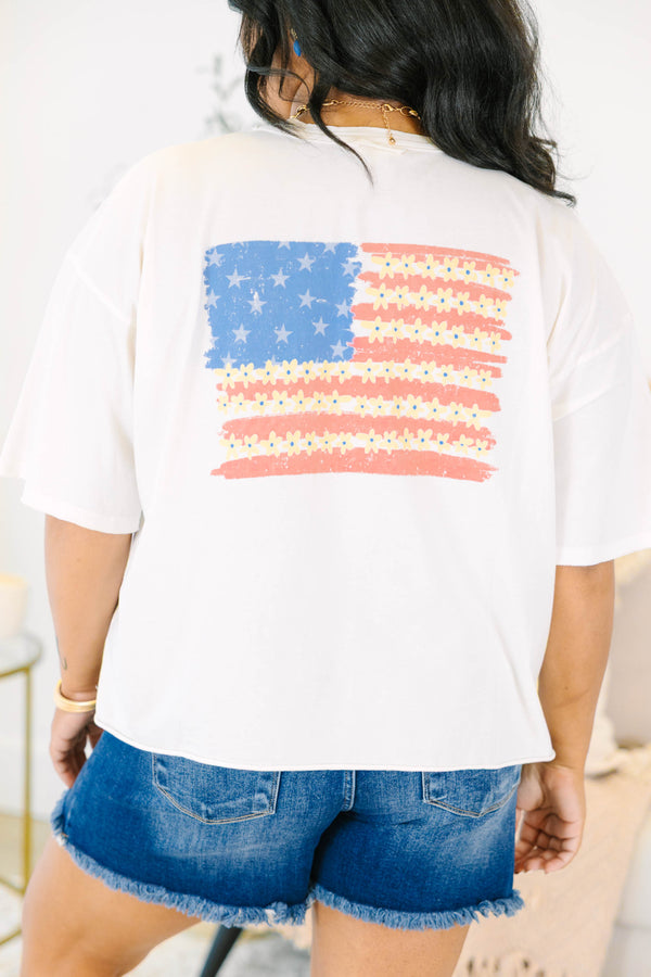 Plus Size white vintage wash tee with a small red and blue sparkler graphic on the chest.