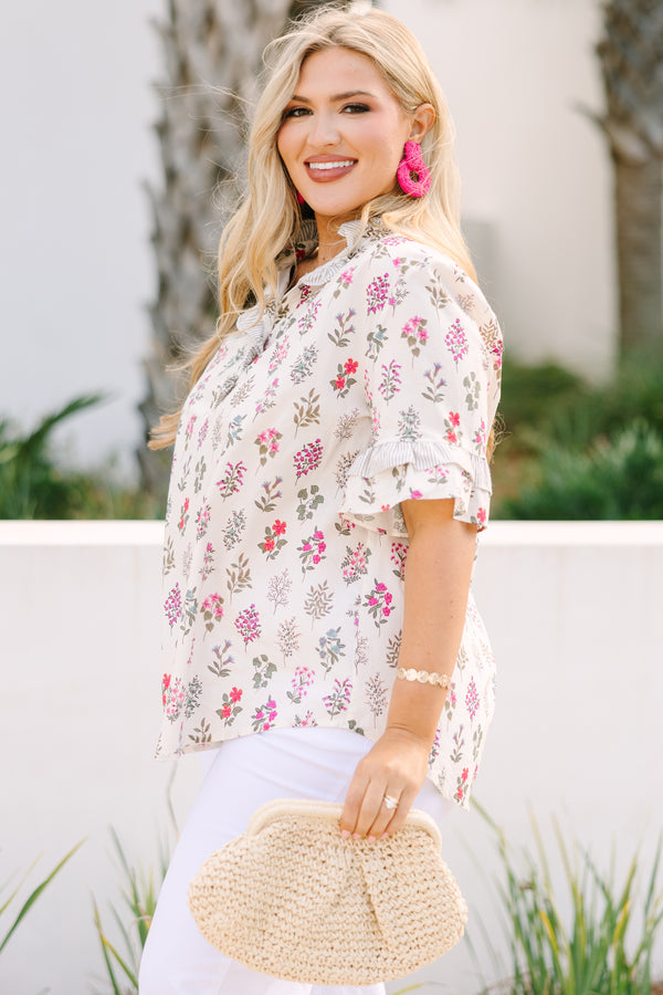 Chic Soul plus size clothing, cream short ruffle sleeve top with pink block floral print and a ruffle v neckline cutout