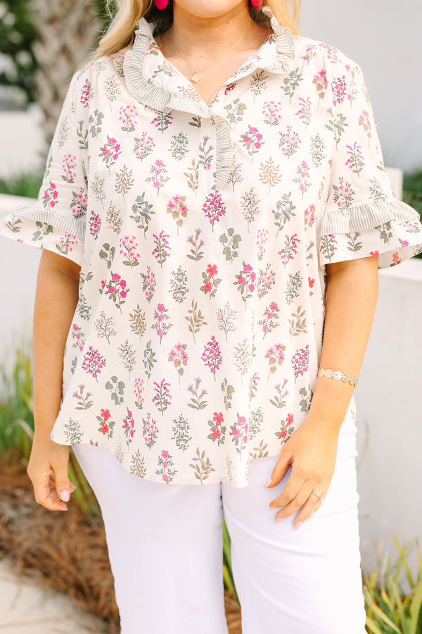 Chic Soul plus size clothing, cream short ruffle sleeve top with pink block floral print and a ruffle v neckline cutout
