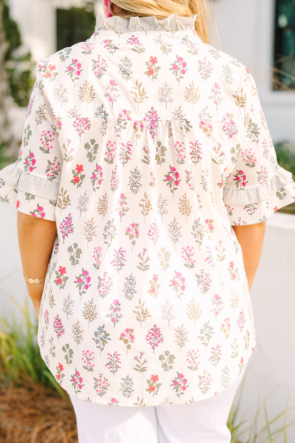 Chic Soul plus size clothing, cream short ruffle sleeve top with pink block floral print and a ruffle v neckline cutout