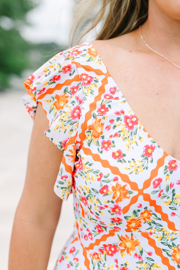 Chic Soul Plus Size Clothing, a primarily orange, pink, and white swimsuit with  ruffle sleeves