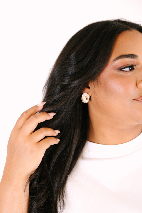 Chic Soul plus size clothing, gold earrings with two circles intertwined together and one of them is a gold metal and the other one has a gold beaded look
