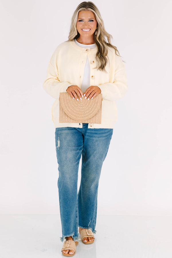 Plus Size vintage wash wide leg jeans with a high waist, distressed details, and frayed hems.