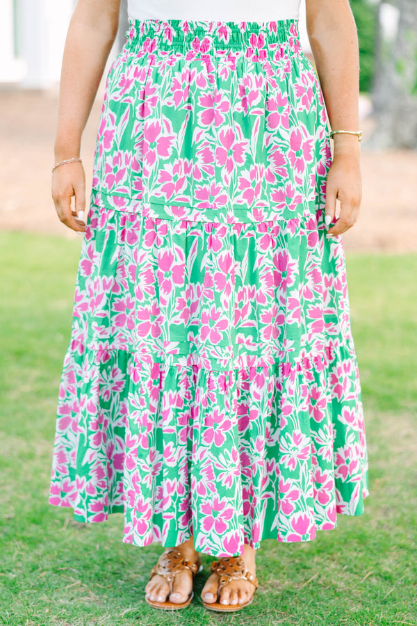 Plus Size tiered maxi skirt in a pink and green floral print with an elastic waistband.