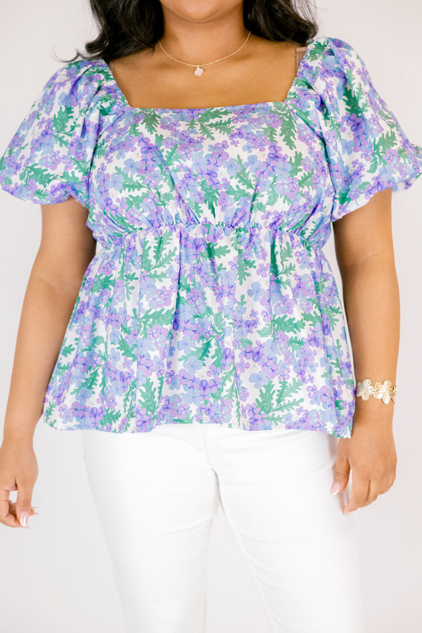 Chic Soul plus size clothing, purple top with bubble sleeves a square neckline and a green and purple floral pattern 