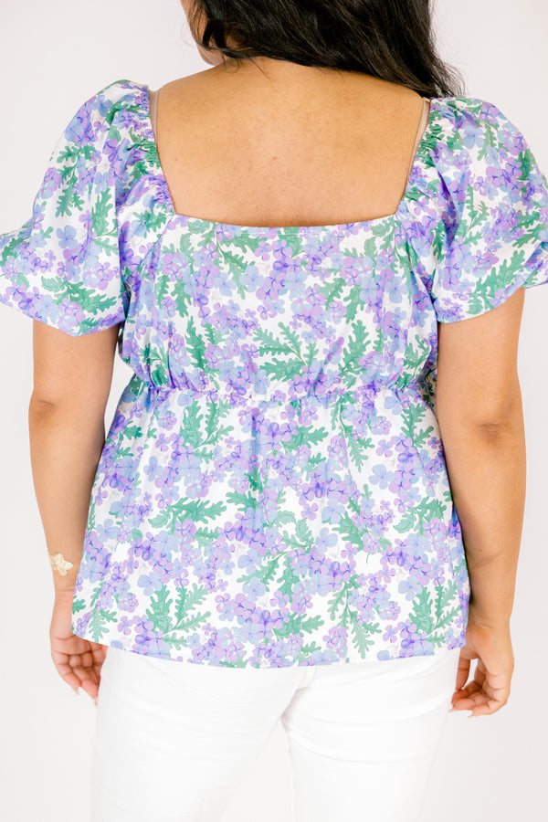 Chic Soul plus size clothing, purple top with bubble sleeves a square neckline and a green and purple floral pattern 