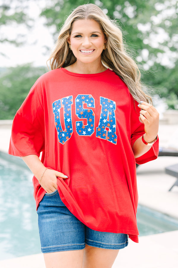 Red oversized boyfriend tee with a crew neck and blue starry USA graphic on the front.