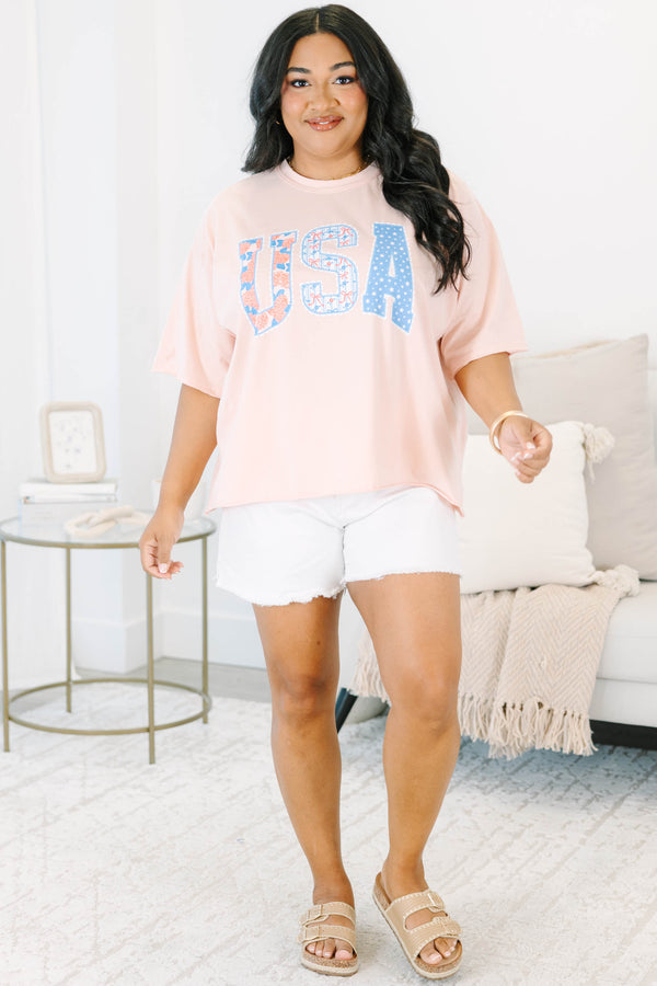 Plus Size blush pink vintage wash tee with USA floral and star patchwork lettering.