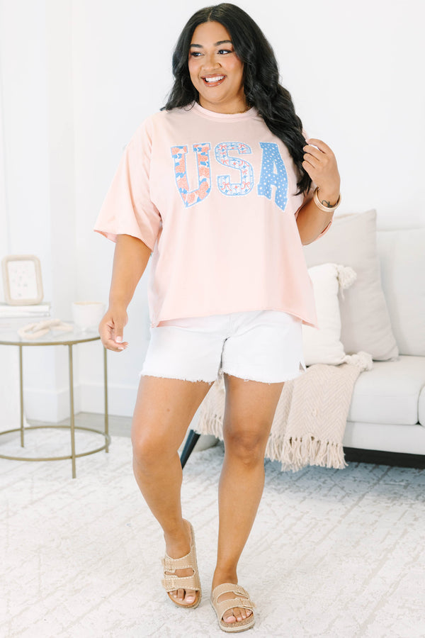 Plus Size blush pink vintage wash tee with USA floral and star patchwork lettering.