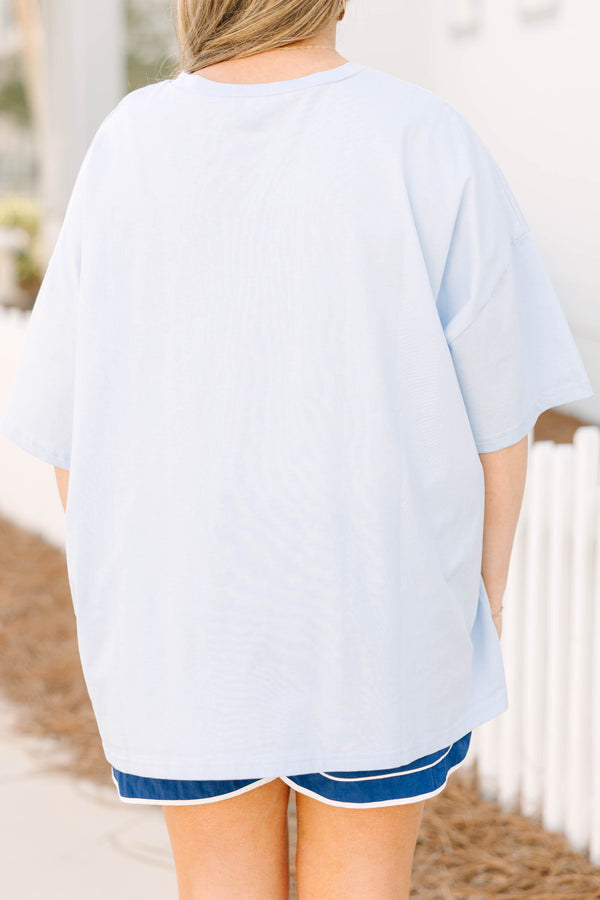 Chic Soul plus size clothing, light blue short sleeve boyfriend tee with light grey smiley face on the front of the tee with darker blue star outlines inside of the smiley face