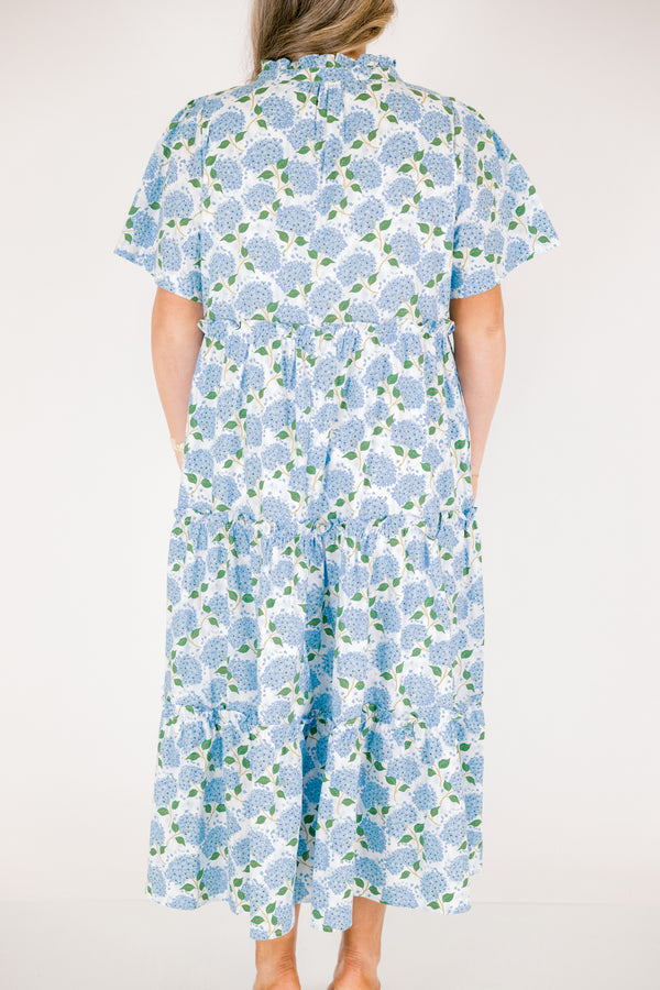 Chic Soul plus size clothing, white tiered maxi dress with short sleeves a slight v-neckline and a blue hydrangea pattern throughout