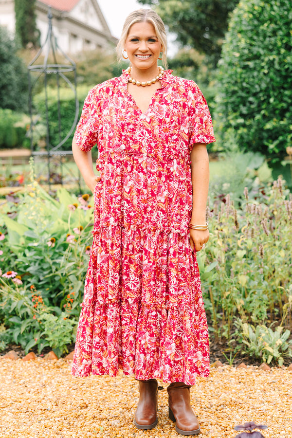 Plus Size pink floral tiered midi dress with short sleeves, a V-neckline, and a relaxed fit.