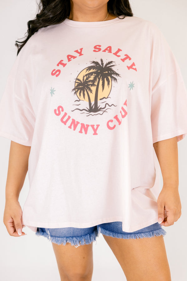 Chic Soul plus size clothing, cream pink short sleeve graphic tee with the a palm tree and sun graphic on the center of the short in a circle shape with the two sayings 
