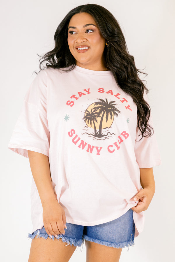 Chic Soul plus size clothing, cream pink short sleeve graphic tee with the a palm tree and sun graphic on the center of the short in a circle shape with the two sayings 