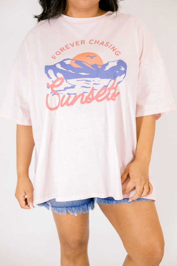 Chic Soul plus size clothing, cream pink short sleeve graphic tee with a mountains graphic on the center of the shirt that has a sunset graphic behind it as well as the saying 