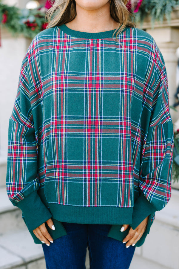 Plus Size green plaid pullover with a crew neckline, oversized fit, and ribbed trim.