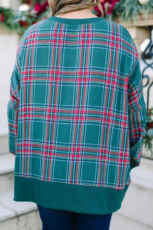 Plus Size green plaid pullover with a crew neckline, oversized fit, and ribbed trim.