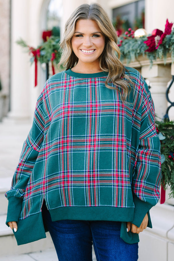 Plus Size green plaid pullover with a crew neckline, oversized fit, and ribbed trim.