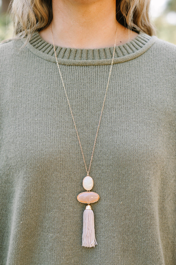 Plus Size long gold chain necklace with white and brown oval stones and a light brown tassel.