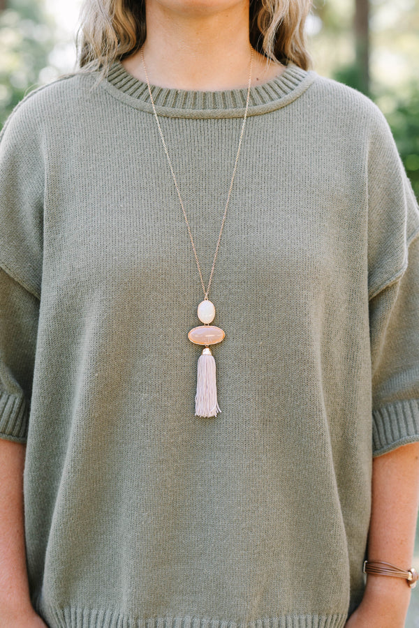 Plus Size long gold chain necklace with white and brown oval stones and a light brown tassel.