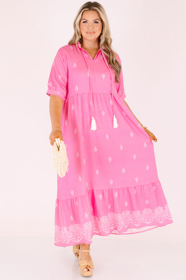 Chic Soul plus size clothing, hot pink maxi dress with short sleeves that have cuffs at the end as well as tassels attached from the neckline and a white block pattern throughout 
