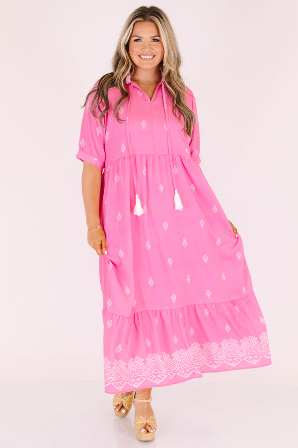 Chic Soul plus size clothing, hot pink maxi dress with short sleeves that have cuffs at the end as well as tassels attached from the neckline and a white block pattern throughout 