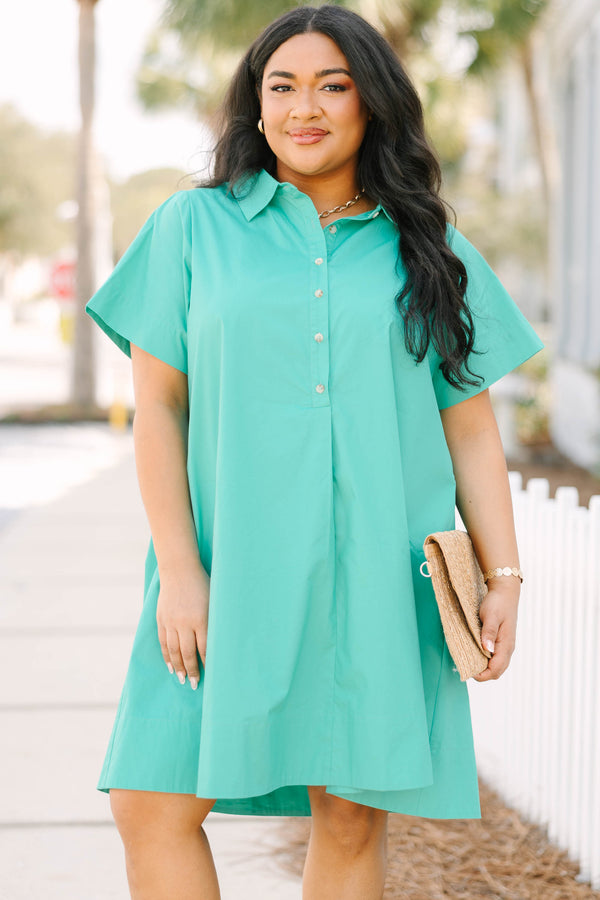 Chic Soul plus size clothing, Kelly green knee length dress with short sleeves a collar detail and buttons going down the neckline to the bottom of the chest area 