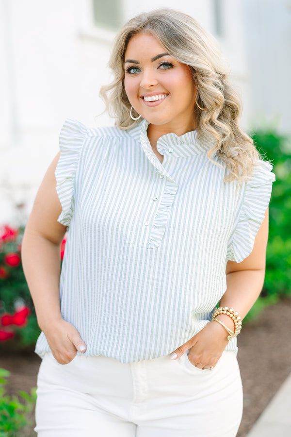 Light green and white pin stripe ruffle cap sleeve top with 3 button neckline and ruffle detailing on the neckline